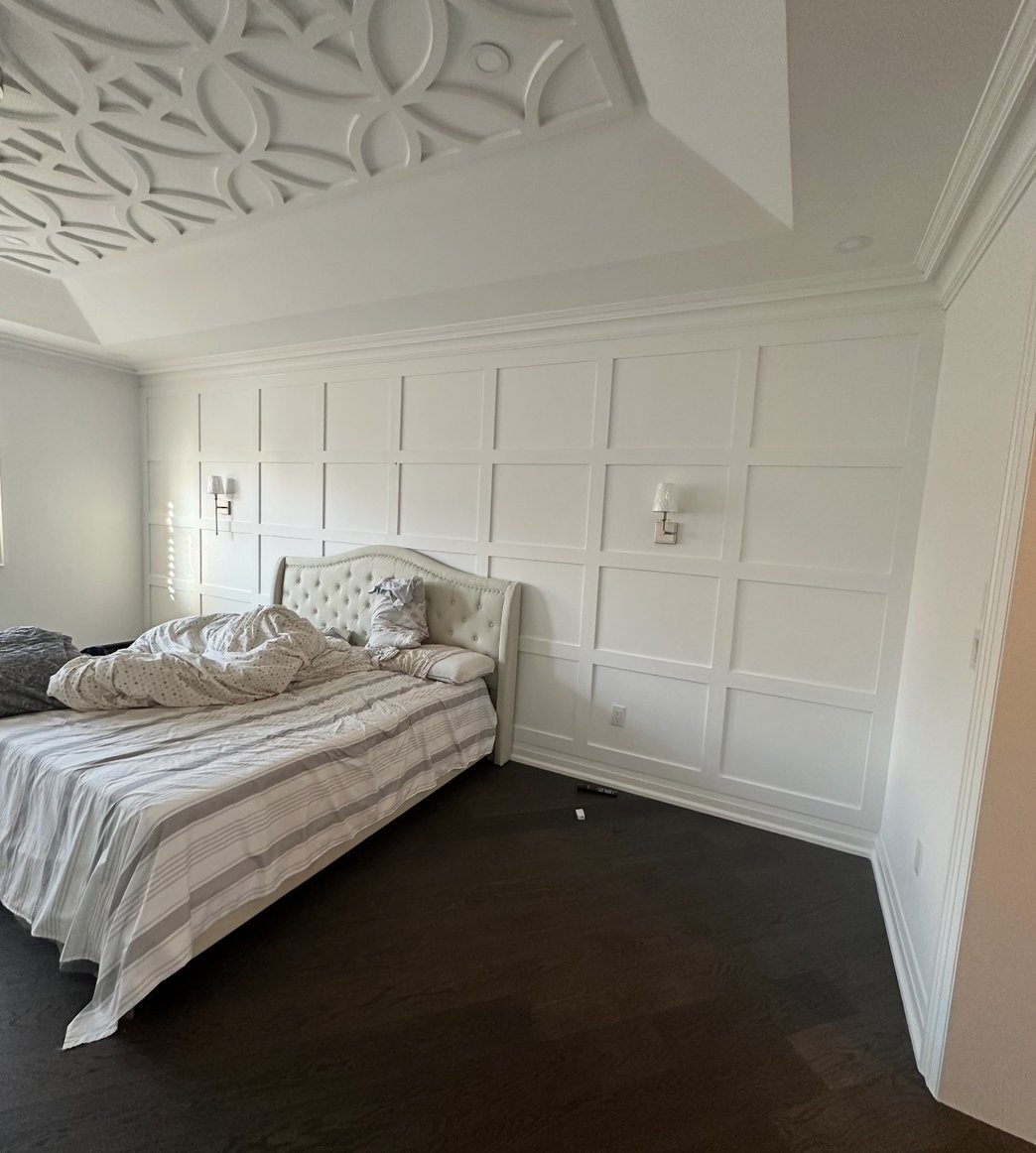 Entry or hallway with dark floors and white walls