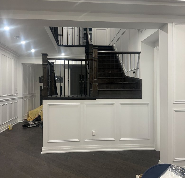 Staircase with light wood treads and white risers