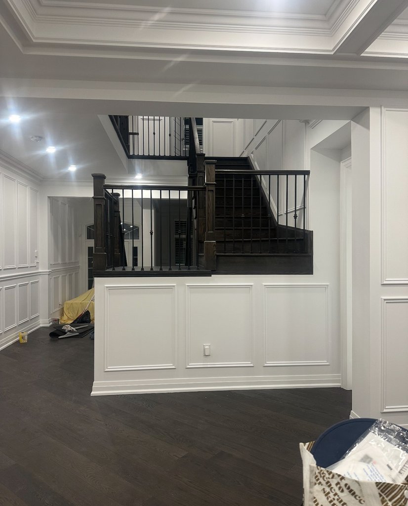 Staircase with light wood treads and white risers