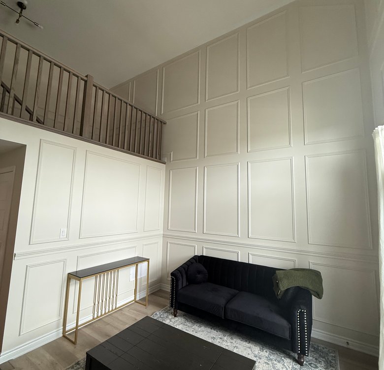 Room with dark accent wall suitable for feature area